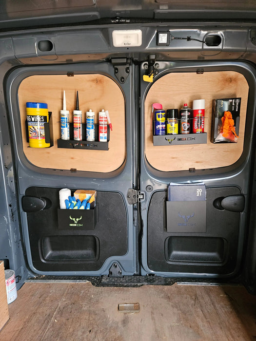 The Van Storage Racking Monthly Bundle Deal showcases open van doors with organized shelves for cleaning supplies, caulk tubes, spray cans, and gloves. Inside features wooden panels and hooks for optimal space efficiency.