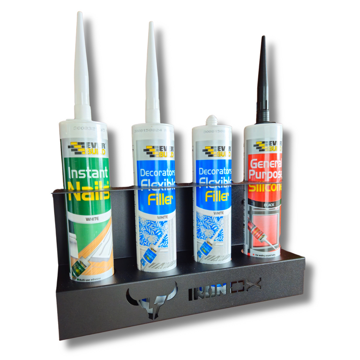 Four tubes of adhesive products are displayed in a sleek, space-saving design. The labels read: "Instant Nails," "Decorators Flexible Filler," "Decorators Flexible Filler (White)," and "General Purpose Silicone." This Silicone Mastic Holder showcases high-quality construction and organization.