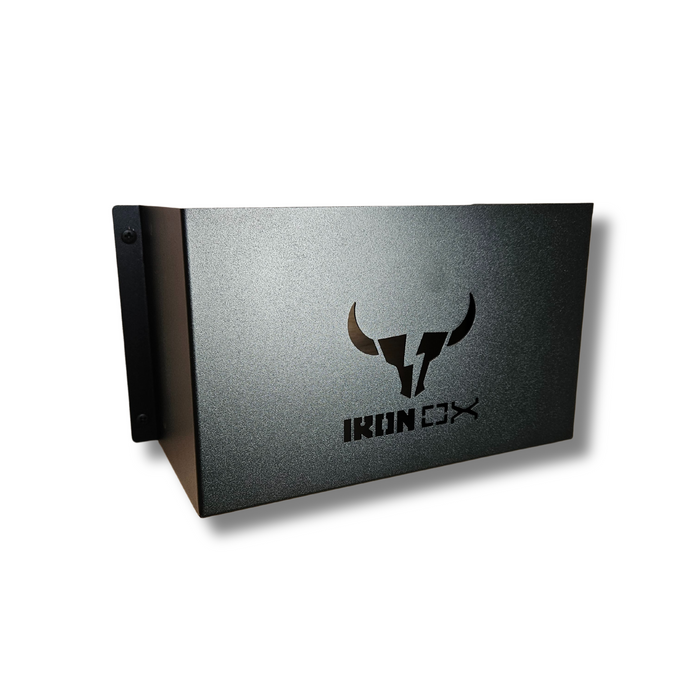 A black metal box with a bull logo and the text "General Purpose Metal Storage Box - Medium" engraved on its surface. The wall-mounted storage unit features mounting brackets on one side, perfect for use as a tool holder or van accessory.