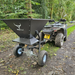 An ATV with a trailer attached is positioned on a dirt path in a forested area. The trailer, identified as the Towable Spreader by Iron Ox, is labeled "IRON OX," ensuring effortless precision in spreading tasks.
Fertilizer Spreader
Lawn Spreader
Seed Spreader
Tow-Behind Spreader
Broadcast Spreader
Drop Spreader
Garden Spreader
ATV Fertilizer Spreader
Lawn Care Equipment
Precision Spreading
Fertilizing Tools
Agricultural Spreader
Seed and Fertilizer Distribution
Spreaders for Large Areas
Heavy-Duty Spreader